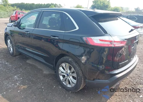 2022 Ford Edge Titanium z USA, uszkodzony, nr VIN 2FMPK4K90NBA39071